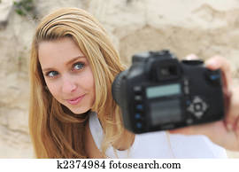 woman taking a self-portrait