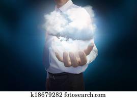 Businessman presenting cloud