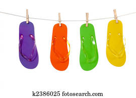 Colorful flip-flop sandles on a Clothesline