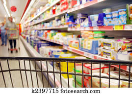 blurred shopping people with supermarket cooling shelf