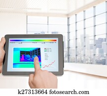 close up of man hands touching tablet pc screen