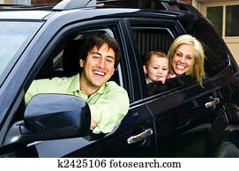 Happy family in car