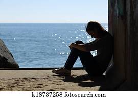 Teen girl lonely and sadness on the beach