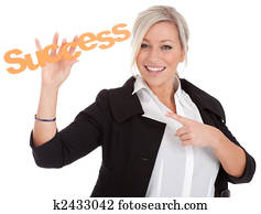 beautiful young businesswoman halts success in her hands