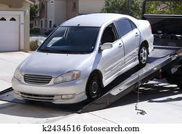 Car being towed away Car being towed away