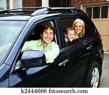 Happy family in car