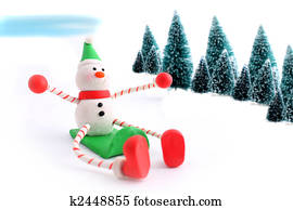 Sledding snowman Sledding snowman