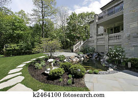 Back yard with stone patio Back yard with stone patio