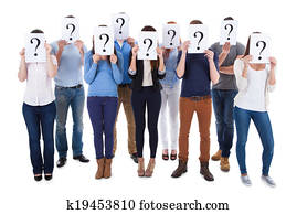 Diverse group of people holding question signs Diverse group of people holding question signs