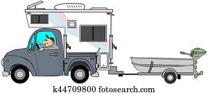 Truck and camper pulling a small boat Truck and camper pulling a small boat