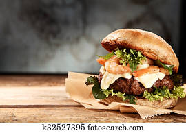 Tasty grilled prawn and beef burger