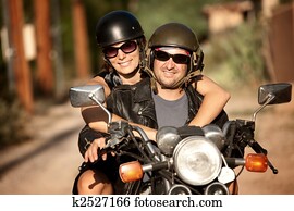 Man and Woman on Motorcycle Man and Woman on Motorcycle