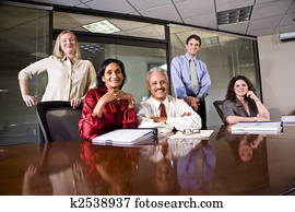 Multi-ethnic colleagues in an office conference room