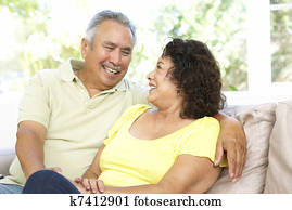 Senior Couple Relaxing At Home Together Senior Couple Relaxing At Home Together