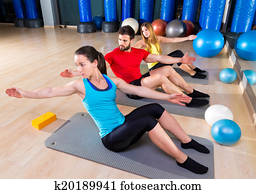 Pilates people group exercise man and women Pilates people group exercise man and women