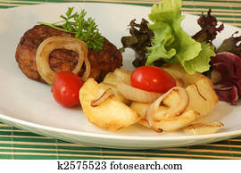 rissole with grilled potato and organic tomato