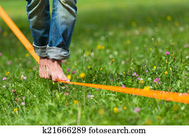Slack line in the city park.