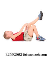 boy lie isolated on white. pain leg