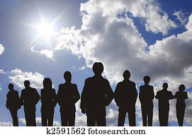 Business people with leader silhouette on sky Business people with leader silhouette on sky