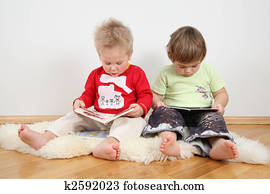 children looking books . wire family is my drawing