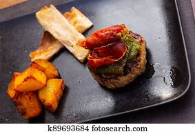 cuisine american burger with fried potato served on plate on table