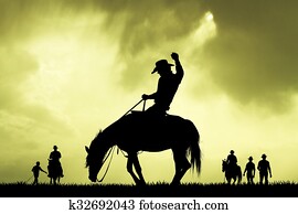 rodeo cowboy slhouette at sunset rodeo cowboy slhouette at sunset