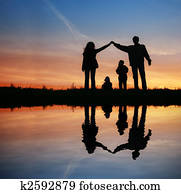 silhouette family house on sunset water silhouette family house on sunset water