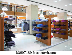 Clothing on shelfs in store
