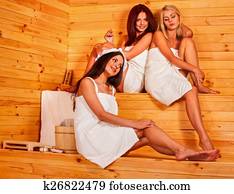 Woman relaxing in sauna. Woman relaxing in sauna.