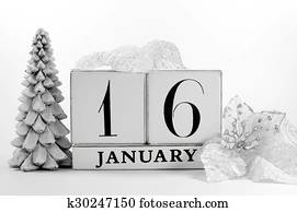 Save the Date vintage shabby chic block calendar with white winter theme snow covered pine tree, snowflake, and poinsettia flowers, for birthdays, events, weddings, or website events, for January 16 Save the Date vintage shabby chic block calendar with white winter theme snow covered pine tree, snowflake, and poinsettia flowers, for birthdays, events, weddings, or website events, for January 16