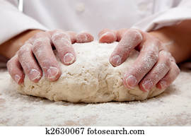 hands kneading bread dough hands kneading bread dough