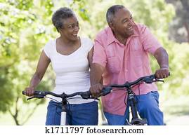 Senior couple on bicycles