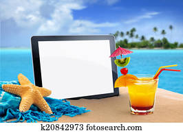 tablet in tropical beach tablet in tropical beach