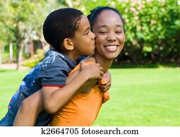 child kiss mother child kiss mother