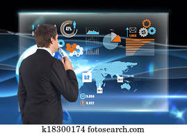 Composite image of thinking businessman holding glasses