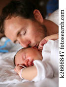 Father kissing his baby