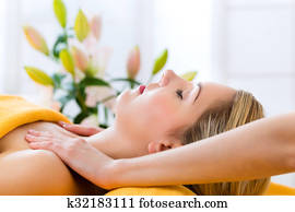 Wellness - woman getting head massage in Spa