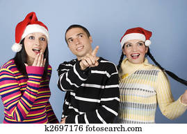 Surprised Christmas people faces looking up