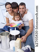 Family chosing colours to paint new house