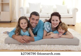 Family on floor in living-room