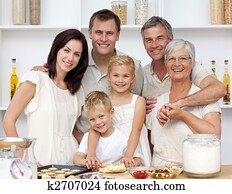Happy family baking in the kitchen Happy family baking in the kitchen