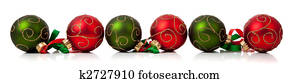 Red and Green Christmas ornaments with ribbon on white Red and Green Christmas ornaments with ribbon on white
