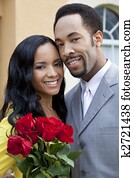 Romantic African American Couple With Bunch Of Roses