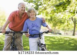 Senior couple on bicycles