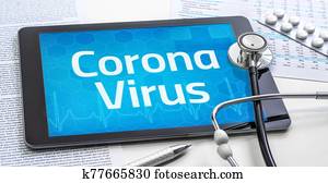 A tablet with the text Corona Virus on the display A tablet with the text Corona Virus on the display