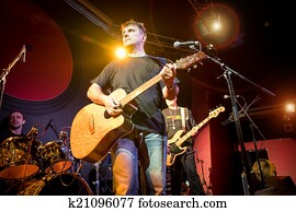 Band performs on stage