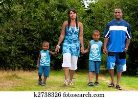 Family is walking in nature