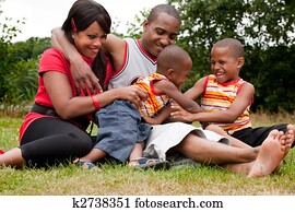 Happy black family enjoying their free day 