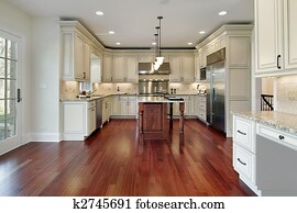 Kitchen with cherry wood floor Kitchen with cherry wood floor