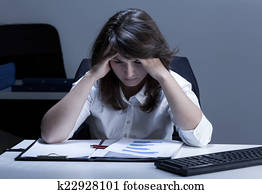 Office worker analyzing chart